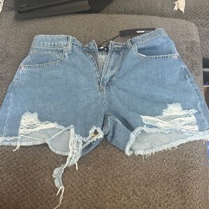 Vans Women's Light Blue Ripped Jean Shorts